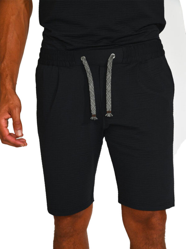 REMI TRIESTE black Bermuda shorts